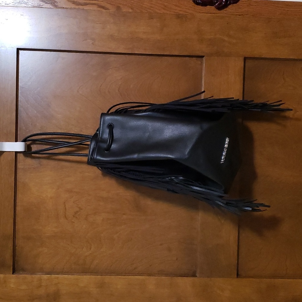 Victoria's Secret fringed backpack style handbag-never used.